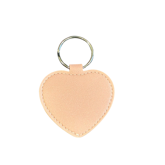 Heart-shaped keychain on a white background