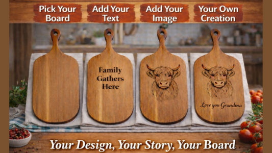 Wooden cutting boards with engraved designs and text on a kitchen counter.