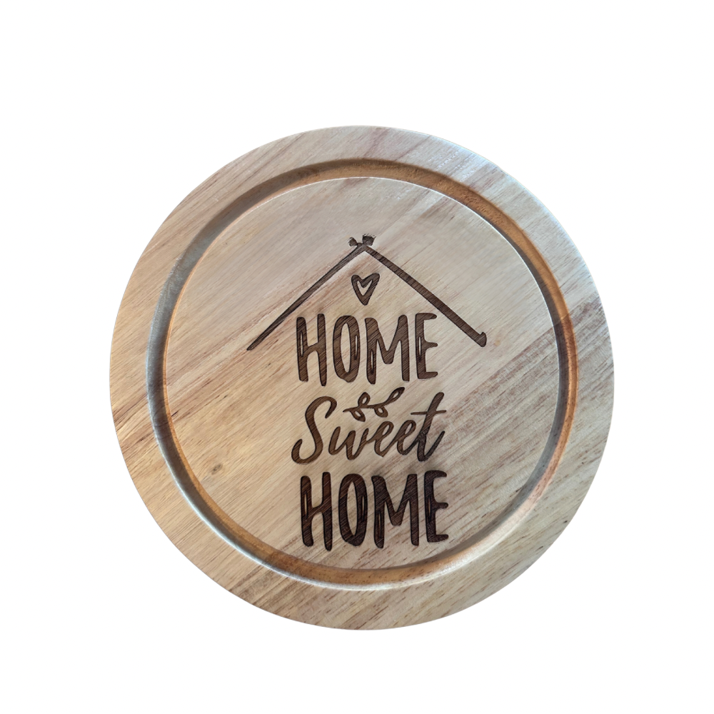 Wooden cheeseboard set  with 'Home Sweet Home' engraving on a white background
