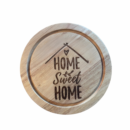 Wooden cheeseboard set  with 'Home Sweet Home' engraving on a white background