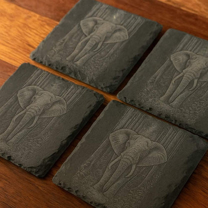 Natural slate drinks coaster featuring detailed elephant engraving