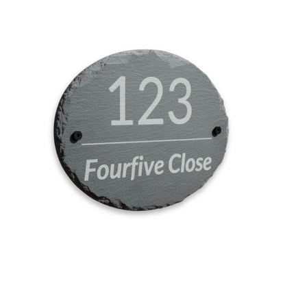 Oval slate house sign engraved with house number and street name