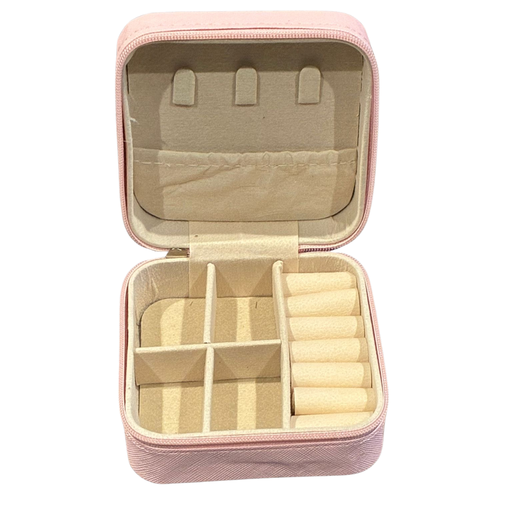 Pink jewellery case with pink interior on a white background