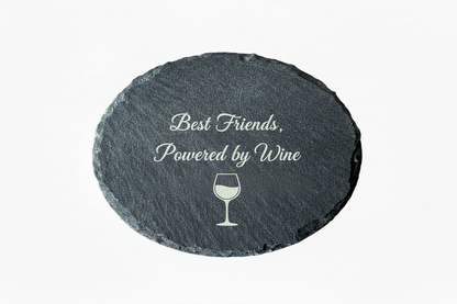 Round slate stone with the text best friends, powered by wine 