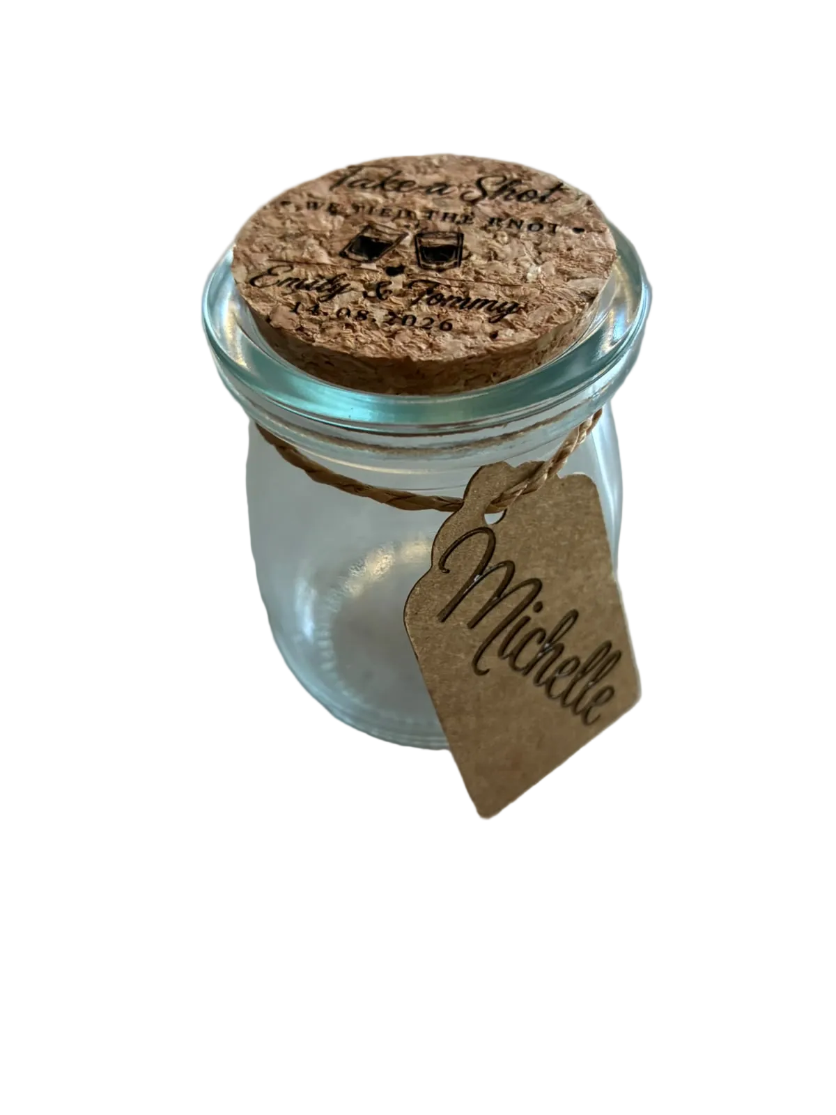 Personalised 3-in-1 wedding shot jar on a white background, featuring a laser-engraved cork lid and kraft guest name tag.