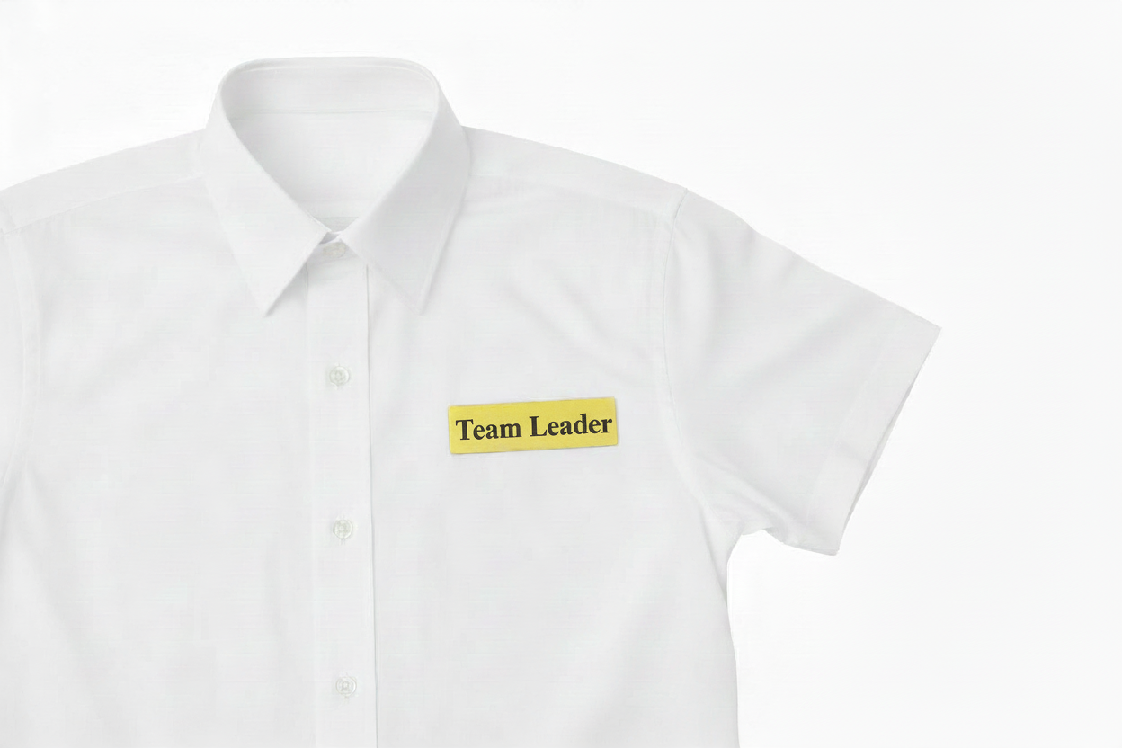 Engraved Pin Badge, Gold Coated with the name Team Leader 
