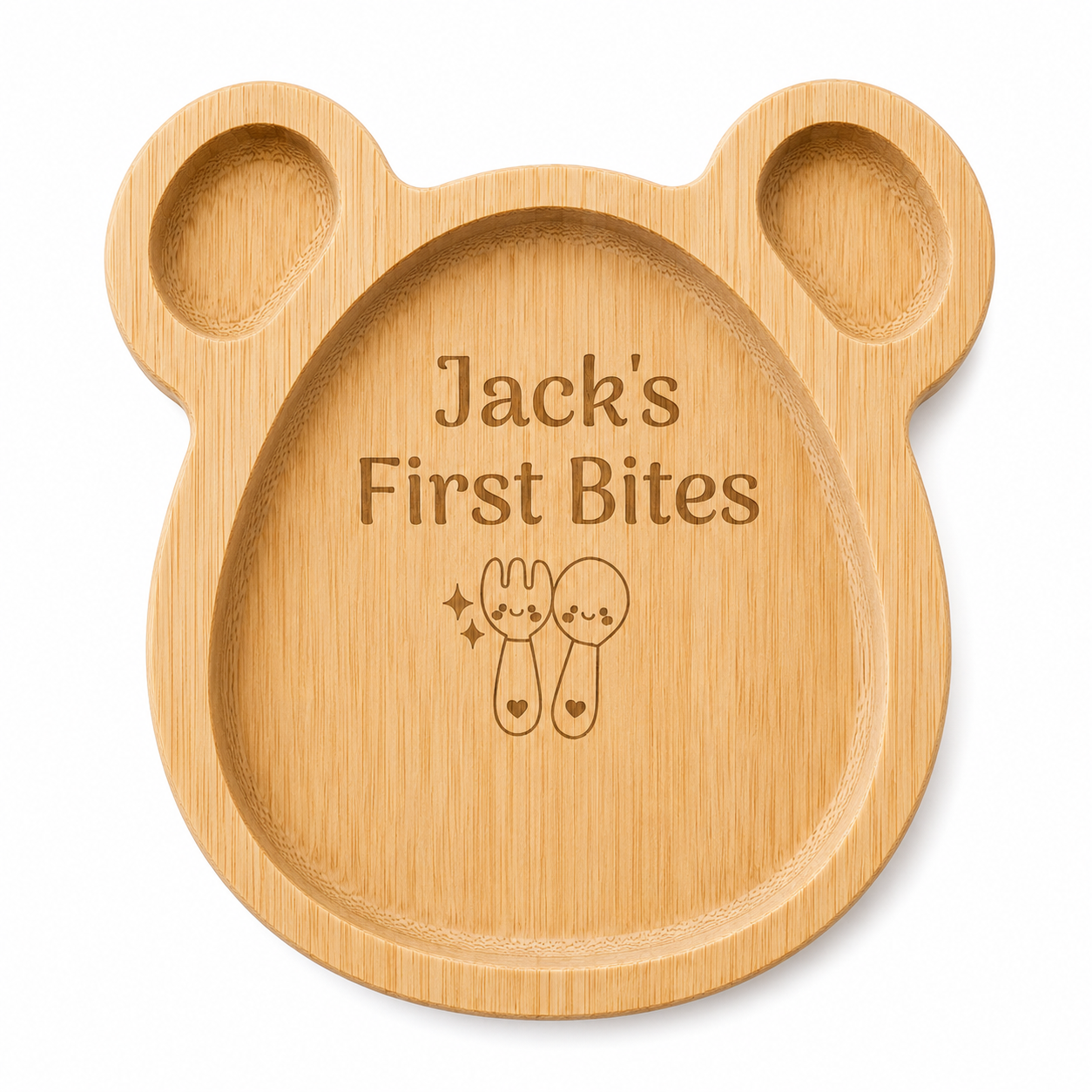 Wooden baby plate shaped like a bear with 'Jack's First Bites' engraving on a white background