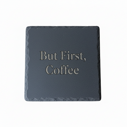 Slate coaster with 'But First, Coffee' text on a white background