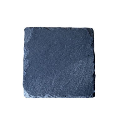 Square black slate coaster stone on a white background
