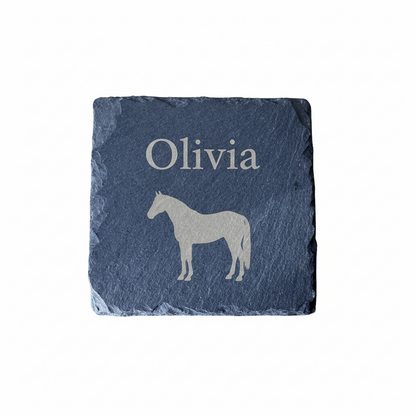 Slate coaster with horse silhouette and 'Olivia' engraving on a white background