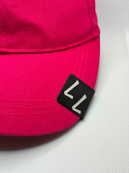 Personalised engraved black metal hat clip on a cap brim