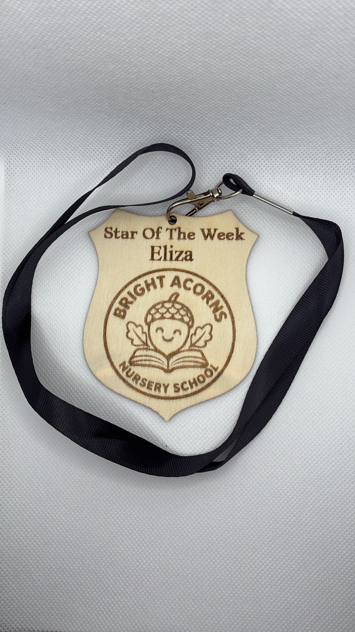 Personalised wooden Star of the Week school medal with black lanyard