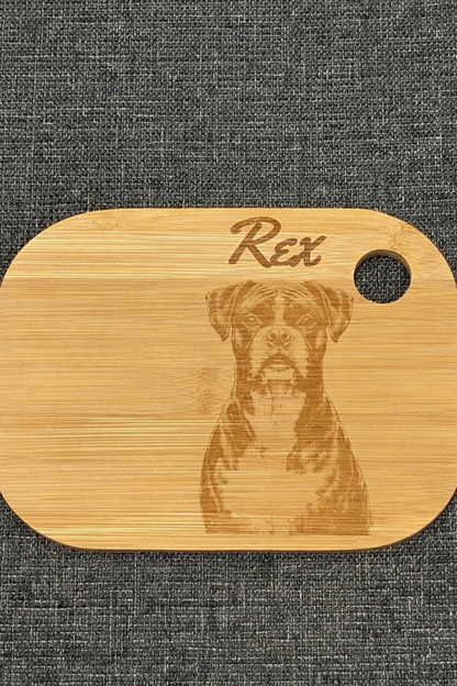 pet dog engraved onto a wooden chopping board with the name above