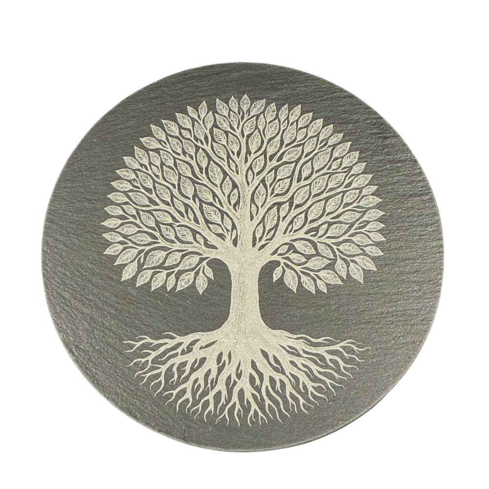 Round coaster with a tree design on a gray background