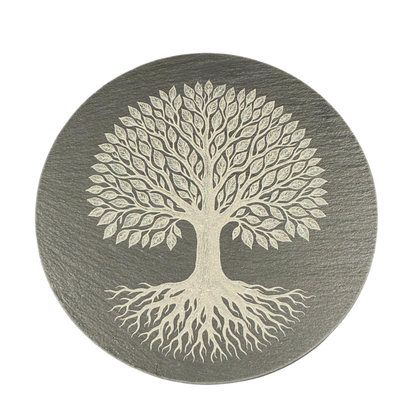 Round coaster with a tree design on a gray background